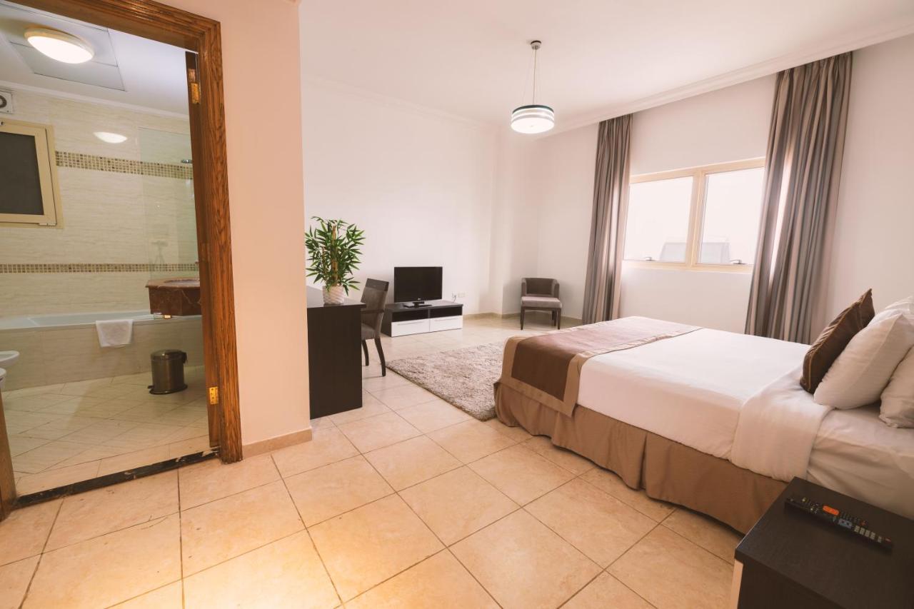 Magnum Hotel & Suites West Bay Доха Экстерьер фото